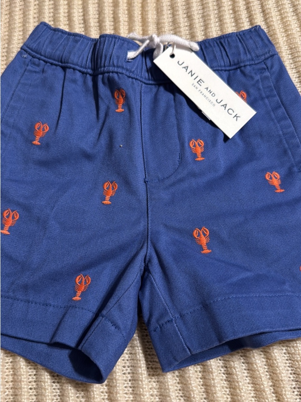 Janie and Jack Royal Blue Shorts with Orange Lobster Embroidery